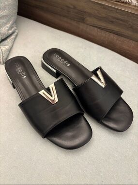 Torgeis Black Slide Mules with Silver V Accent